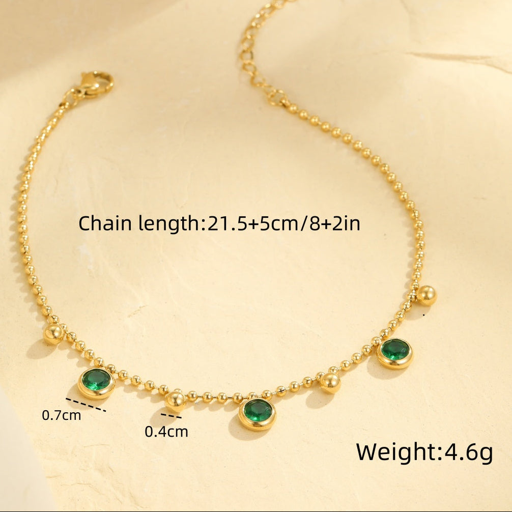 Floating Emerald Crystal Charm Bracelet with green bezel-set CZ stones on gold ball chain